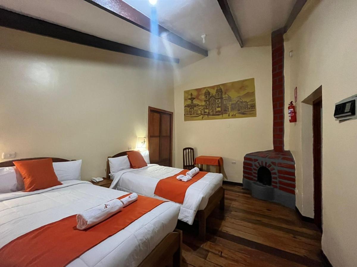 Отель Hostal Andenes De Alabado Куско Экстерьер фото