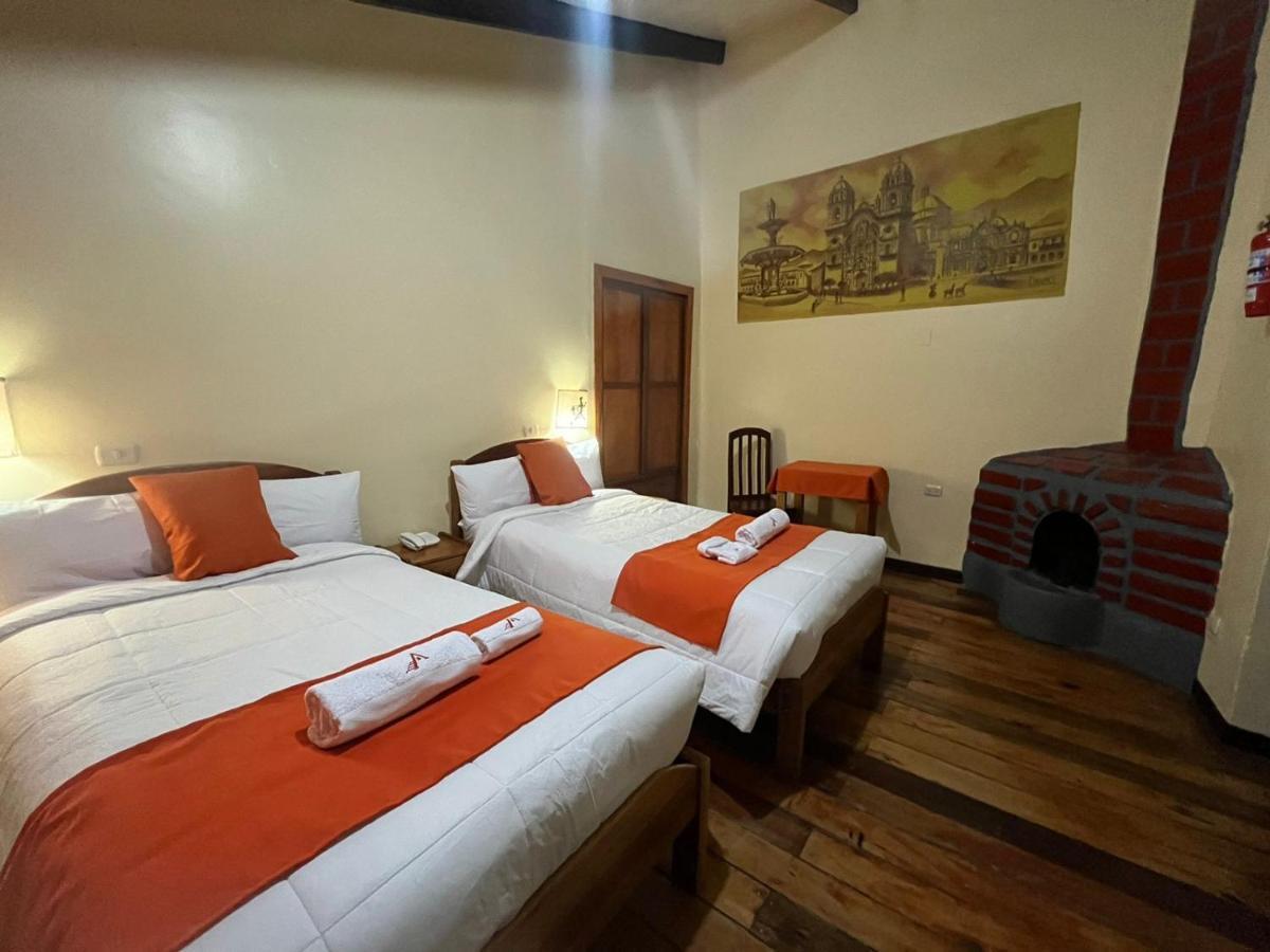 Отель Hostal Andenes De Alabado Куско Экстерьер фото