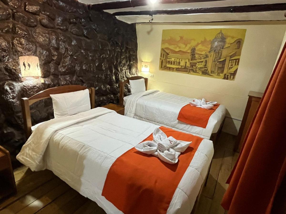 Отель Hostal Andenes De Alabado Куско Экстерьер фото