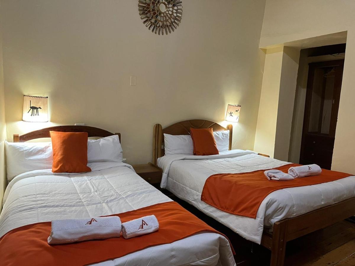 Отель Hostal Andenes De Alabado Куско Экстерьер фото